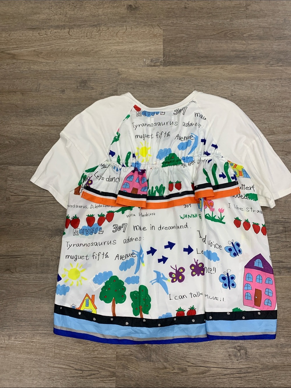 Girls White Graphic Ruffle Peplum Top with Multicolor Print